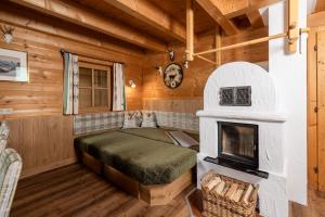 Postel nebo postele na pokoji v ubytování Family Lodge Maximilian