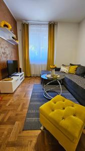 Posezení v ubytování APARTMAN SUNFLOWER
