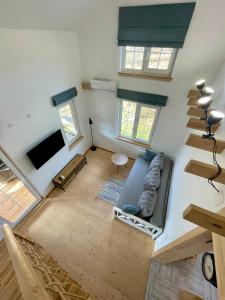 TV a/nebo společenská místnost v ubytování Nafta Aparts & Villas + 37 fotografií