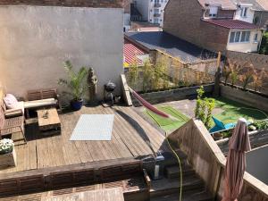 una vista aerea su una terrazza con parco giochi di Villaloha Deluxe Bray-dunes Beach a Bray-Dunes Altre 2 foto