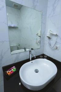 Ένα μπάνιο στο Hotel Dafam Rio