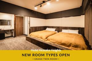 a bedroom with a bed in a room at Hotel Akasaka Heights in Fukuoka