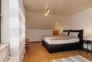 Postel nebo postele na pokoji v ubytování Ferienwohnung Ankel