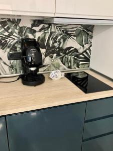 a hair dryer sitting on top of a counter at Tospito in Turin