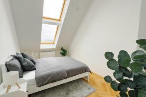 Postel nebo postele na pokoji v ubytování 110qm, 4 bedrooms, near Schönbrunn - Axara Housing OSW 33