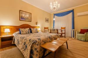 Postel nebo postele na pokoji v ubytování Hotel Pousada da Neve