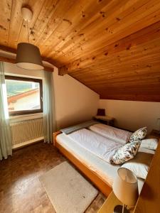 Postel nebo postele na pokoji v ubytování Voldersberghof