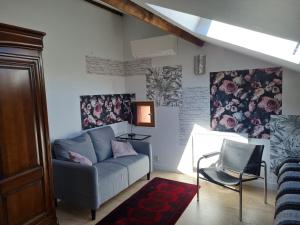 Posezení v ubytování Espace Beléverte Bussière 1 Tamaris appartement meublé de 2 chambres