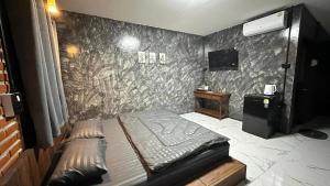 TV a/nebo společenská místnost v ubytování บ้านภทรพรรณ ขุนยวม แม่ฮ่องสอน PATARAPHAN HOUSE, Khunyuam, Maehongson, Thailand
