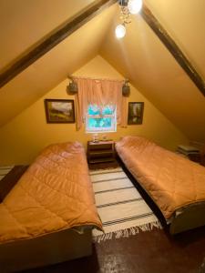 Postel nebo postele na pokoji v ubytování Guest house ''Stropiki'' with Sauna and hot Tub