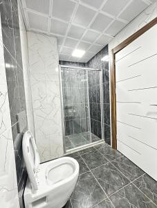 Koupelna v ubytování Renaissance Apart Hotel