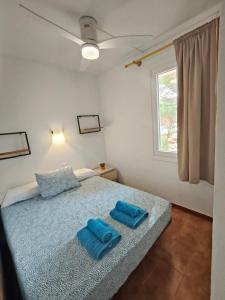 Postel nebo postele na pokoji v ubytování Apartamento Menorca Arenal d'en Castell + 7 fotografií