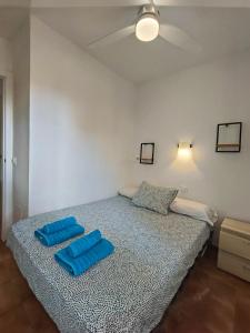 Postel nebo postele na pokoji v ubytování Apartamento Menorca Arenal d'en Castell