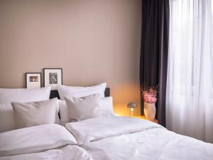 Postel nebo postele na pokoji v ubytování STAYERY Cologne Sülz