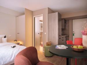 Postel nebo postele na pokoji v ubytování STAYERY Cologne Sülz