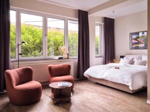 Postel nebo postele na pokoji v ubytování STAYERY Cologne Sülz