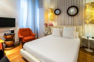 TV a/nebo společenská místnost v ubytování Abalú Design Boutique Hotel Gran Via