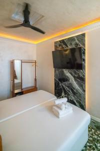Postel nebo postele na pokoji v ubytování Abalú Design Boutique Hotel Gran Via