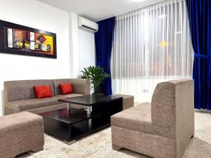 Zona de estar de SC Central Suite