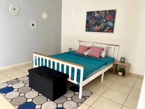Postel nebo postele na pokoji v ubytování Appartement Le Nid de Coco
