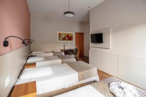 TV a/nebo společenská místnost v ubytování Hotel Cisne