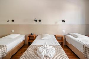 Postel nebo postele na pokoji v ubytování Hotel Cisne + 35 fotografií