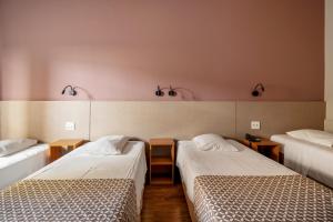 Postel nebo postele na pokoji v ubytování Hotel Cisne