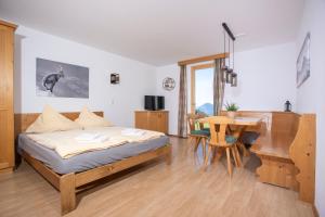Voodi või voodid majutusasutuse Alpenrelax Krepperhütte toas