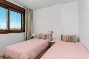 Ένα ή περισσότερα κρεβάτια σε δωμάτιο στο Casa Amorosa +10 φωτογραφίες