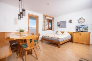 Voodi või voodid majutusasutuse Alpenrelax Krepperhütte toas