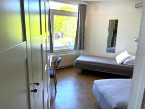 Postel nebo postele na pokoji v ubytování Hostel Oslofjord