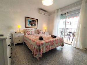 Posteľ alebo postele v izbe v ubytovaní Nerja Sun Apartment Bahía