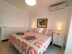 Posteľ alebo postele v izbe v ubytovaní Nerja Sun Apartment Bahía