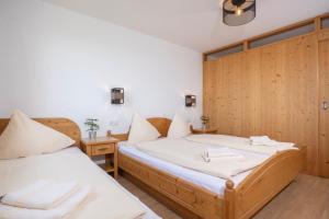 Voodi või voodid majutusasutuse Alpenrelax Krepperhütte toas