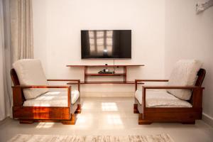 TV a/nebo společenská místnost v ubytování KKJ House