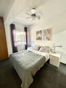 Giường trong phòng chung tại Beach apartment