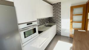 Cuina o zona de cuina de Quartier Dúplex VUT-LE-1172