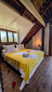 Postel nebo postele na pokoji v ubytování Chalet TEMAE