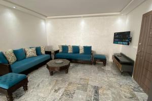 O zonă de relaxare la Appartement neuf luxe OLM à Rabat