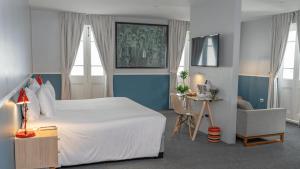 Cama ou camas em um quarto em Casa Republica Barranco Boutique Hotel