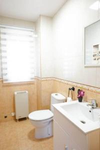 Koupelna v ubytování Amplia casa en Granada ideal para familias