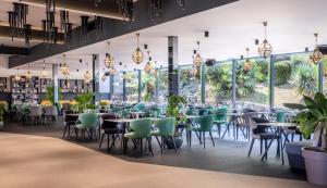 Ein Restaurant oder anderes Speiselokal in der Unterkunft Grand Hotel Adriatic II 