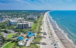 an aerial view of a beach and the ocean at Pool View in Pawleys Island in Pawleys Island