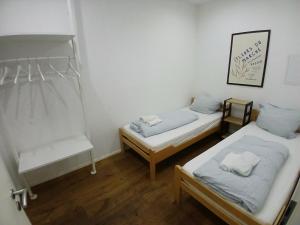 a room with two beds and a bunk bed at Apartment central in Bad Saulgau