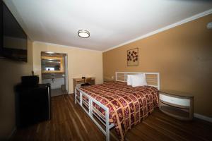 Postelja oz. postelje v sobi nastanitve Sinbad Motel