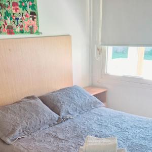 Postel nebo postele na pokoji v ubytování Lugar soñado