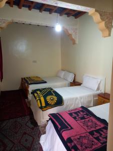 Letto o letti in una camera di gîte d'étape ziz oasis