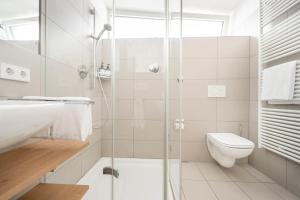 Ένα μπάνιο στο BodenseeApartment Suite