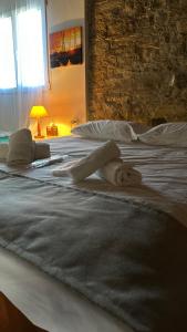 Voodi või voodid majutusasutuse Loucy’s Art Home toas