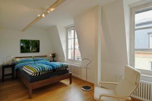 Postel nebo postele na pokoji v ubytování Luxury Apartments Justingerweg Bern